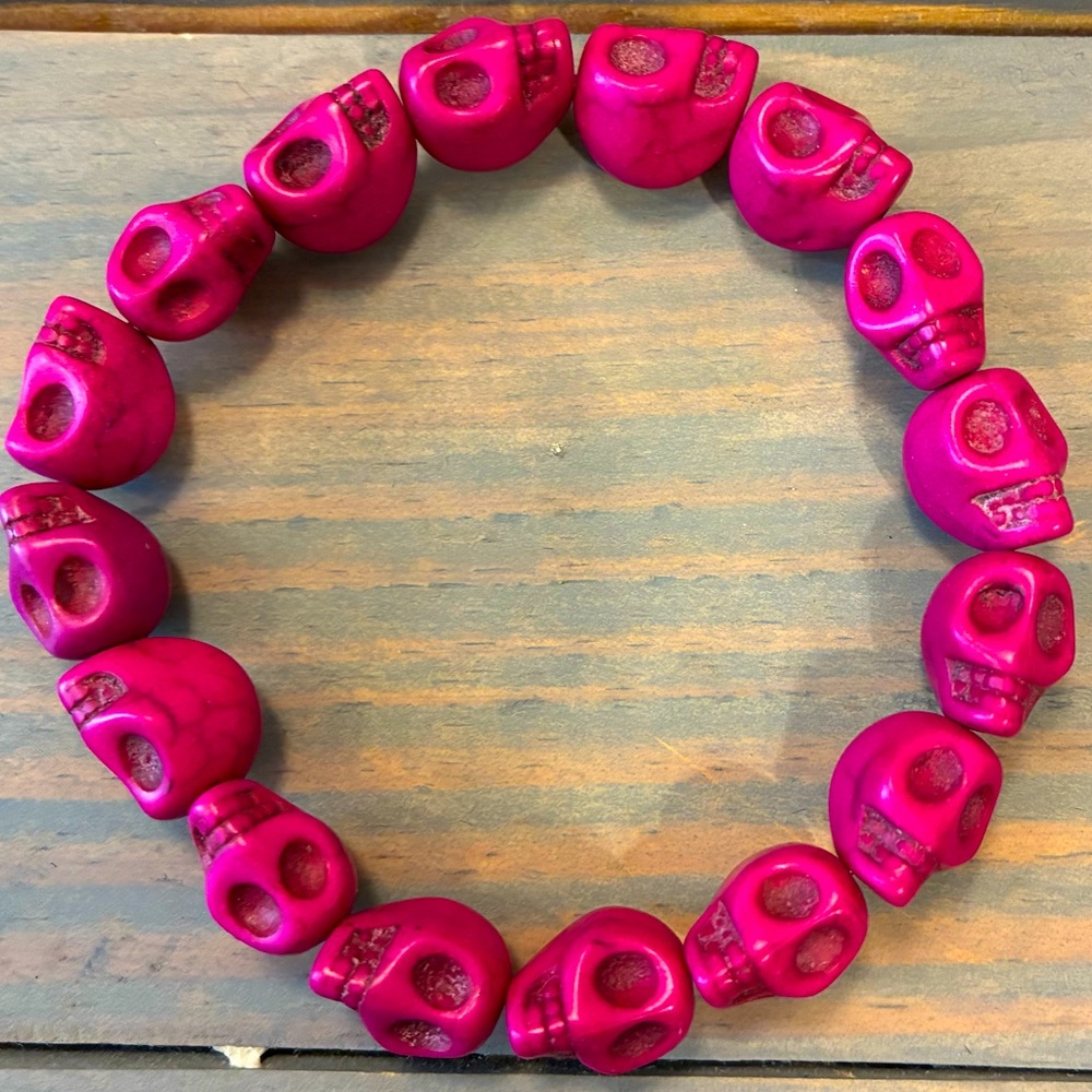 Magenta Skull Bead Bracelet.